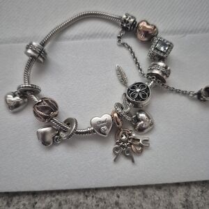 Pandora Silver and Rose Gold Charm Bracelet with Heart and Floral Accents
